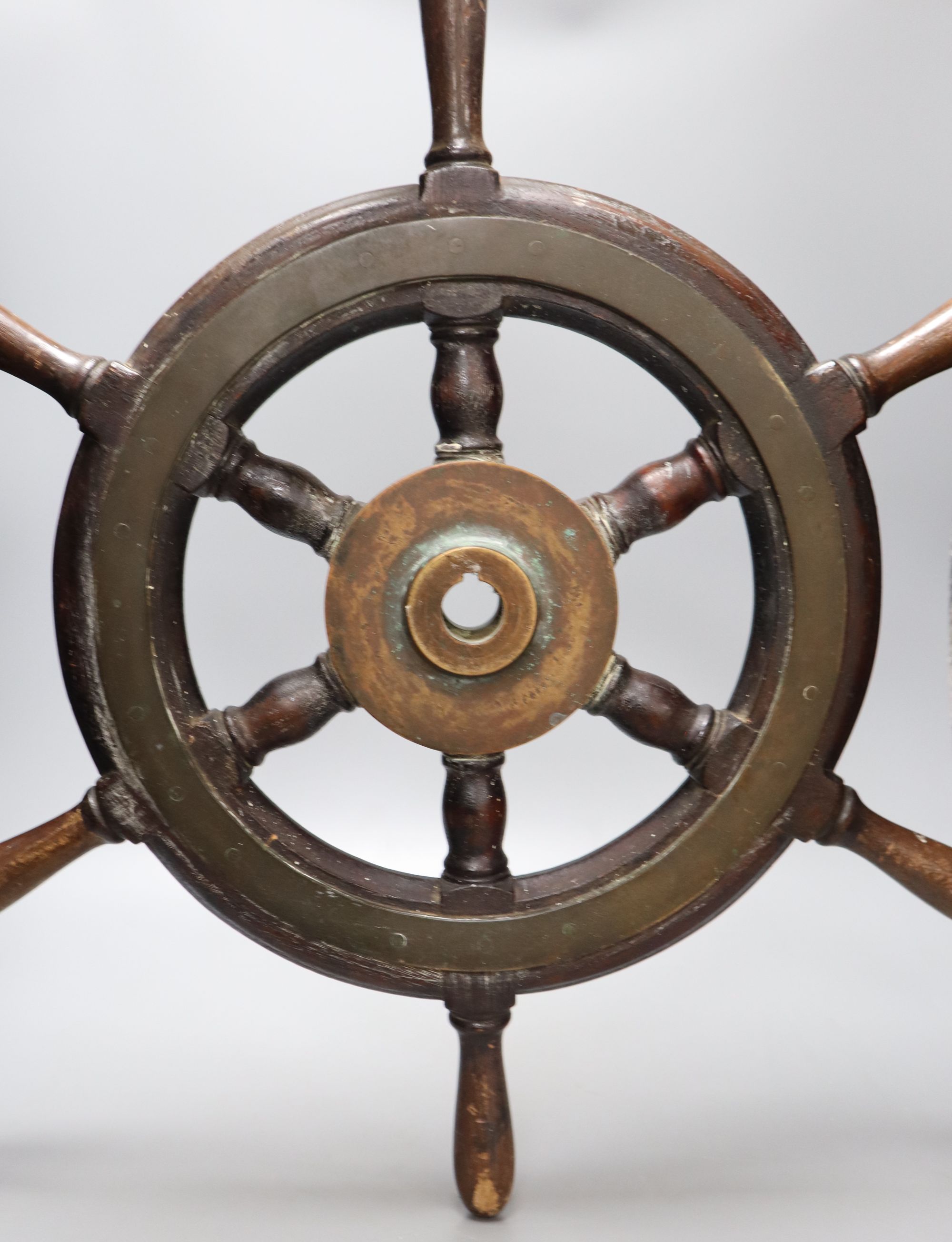 A small 19th century brass and hardwood ships wheel, width 56cm